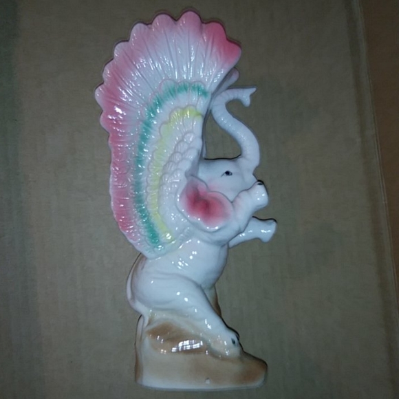 Vintage vase elephant with wings